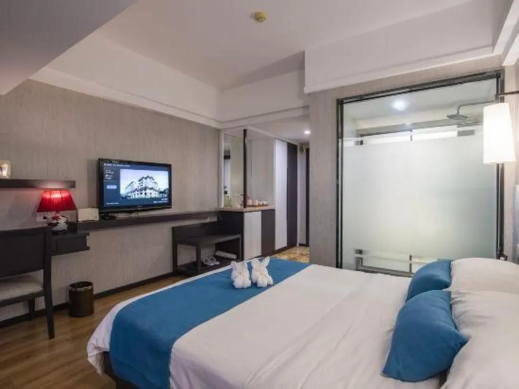 Bed in Ramada Encore by Wyndham Qionghai Downtown