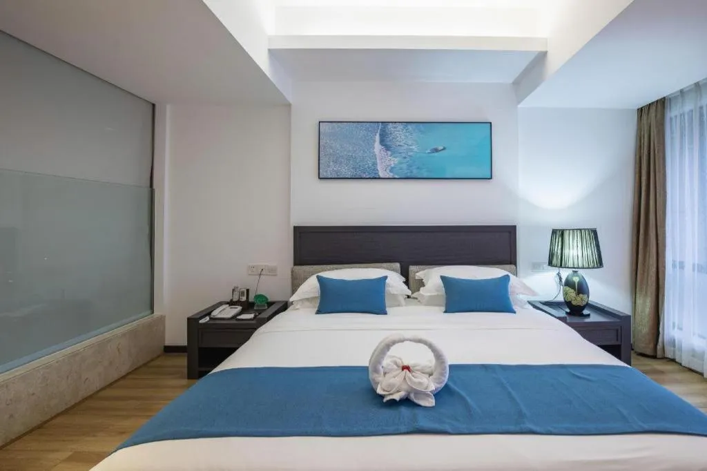 Bed in Ramada Encore by Wyndham Qionghai Downtown