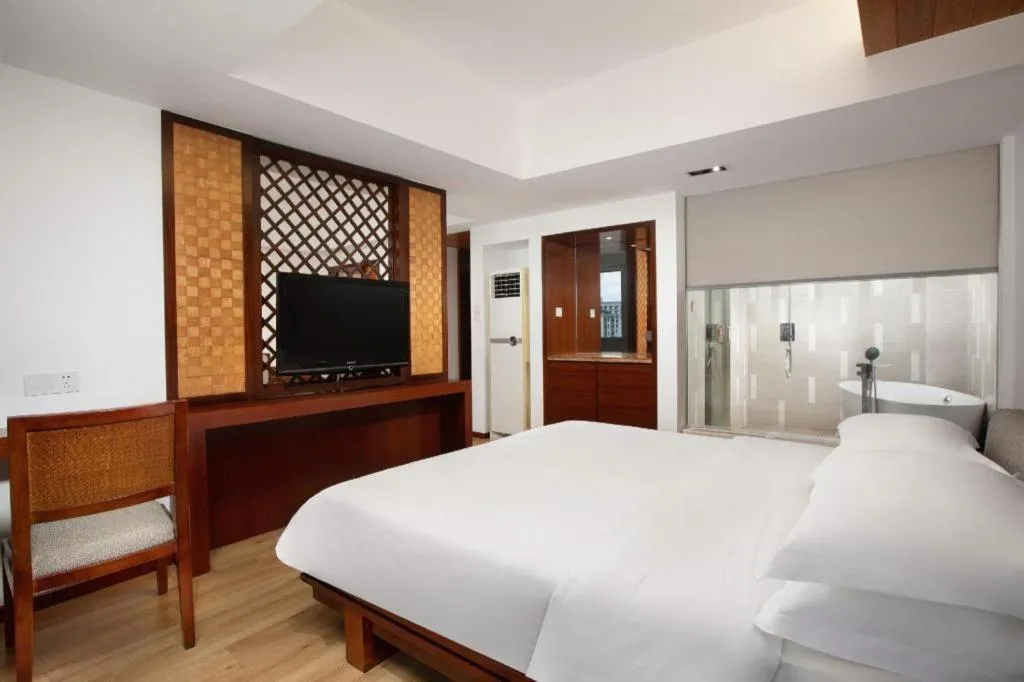 Bed in Ramada Encore by Wyndham Qionghai Downtown
