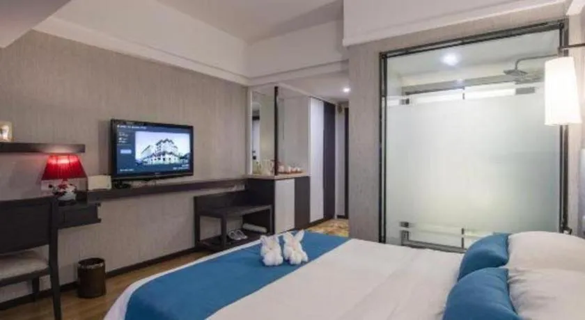 Bed in Ramada Encore by Wyndham Qionghai Downtown