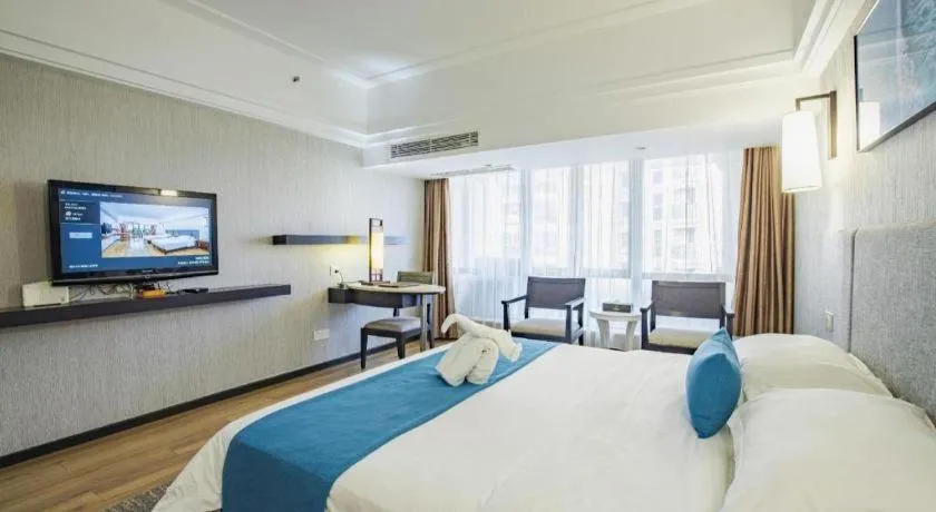 Bed in Ramada Encore by Wyndham Qionghai Downtown