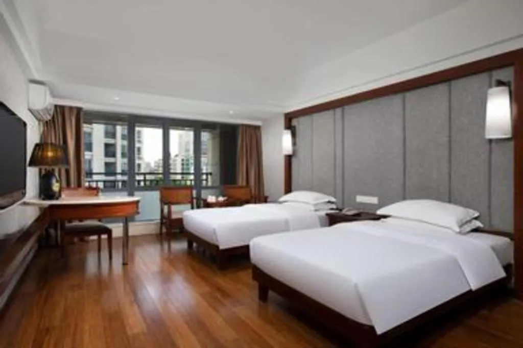 Bed in Ramada Encore by Wyndham Qionghai Downtown