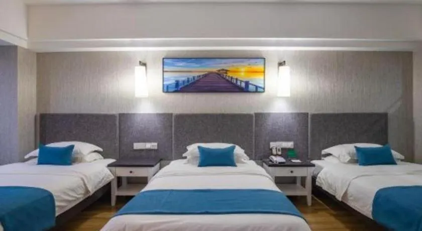 Bed in Ramada Encore by Wyndham Qionghai Downtown