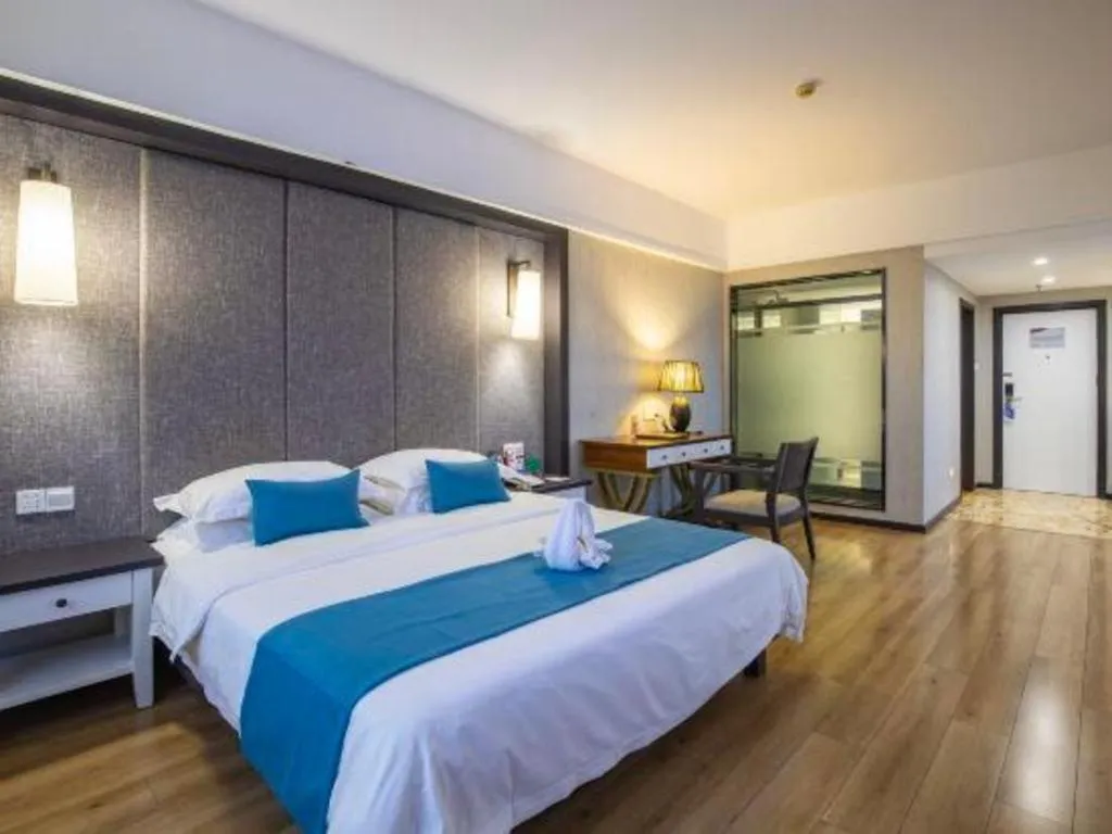Bed in Ramada Encore by Wyndham Qionghai Downtown