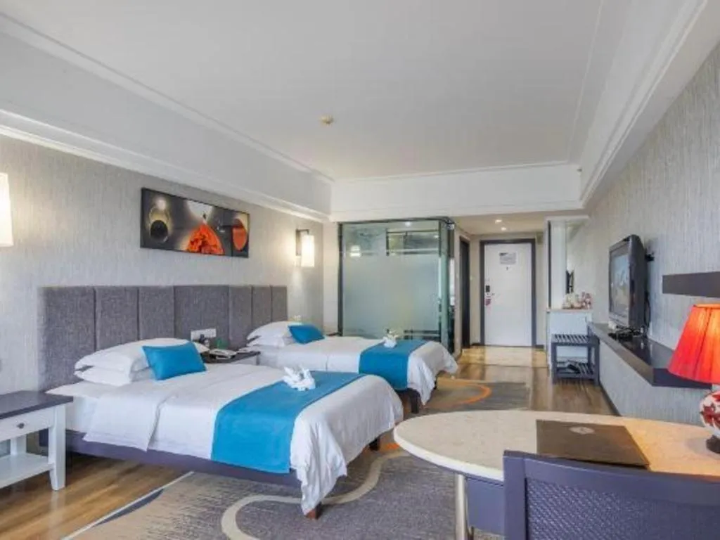 Bed in Ramada Encore by Wyndham Qionghai Downtown