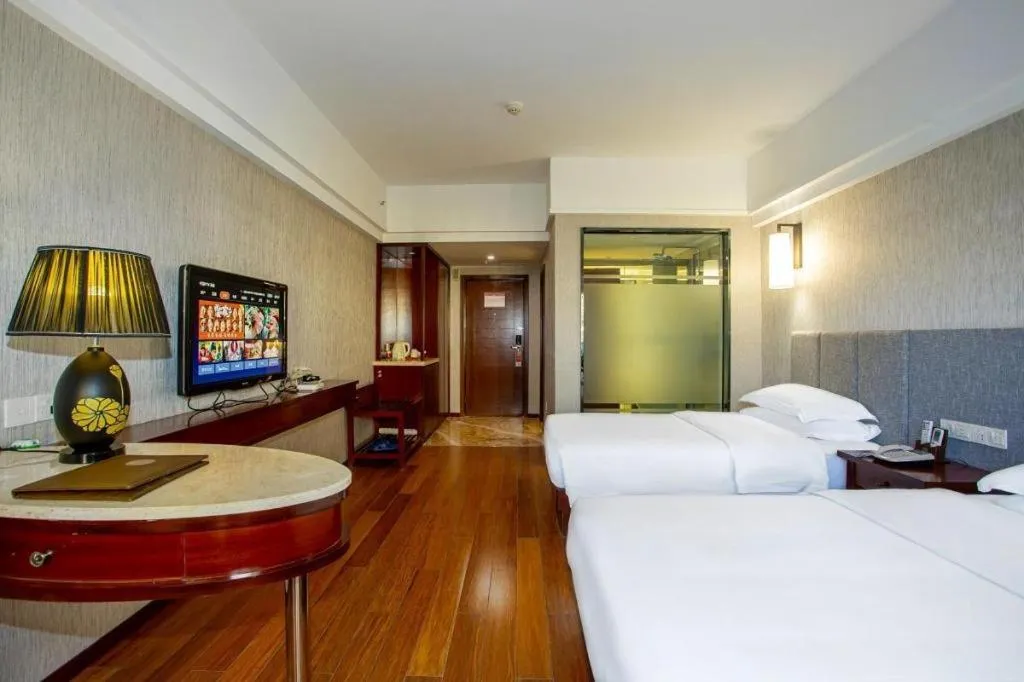 Bed in Ramada Encore by Wyndham Qionghai Downtown