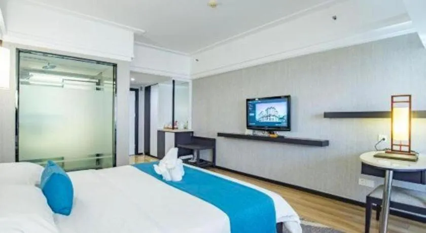 Bed in Ramada Encore by Wyndham Qionghai Downtown