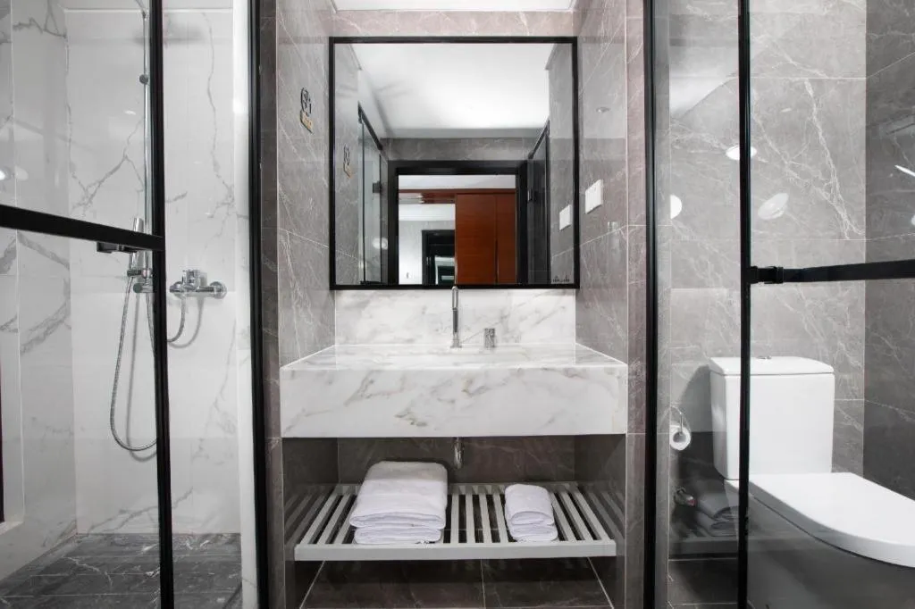 Bed in Ramada Encore by Wyndham Qionghai Downtown