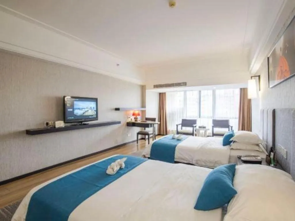 Bed in Ramada Encore by Wyndham Qionghai Downtown