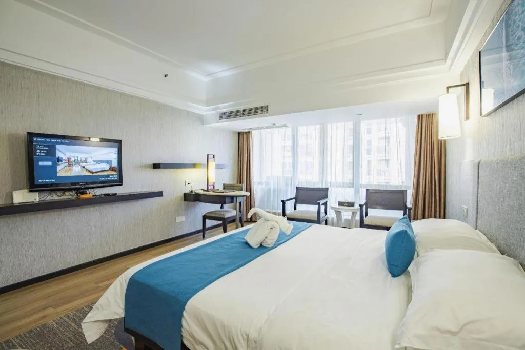 Bed in Ramada Encore by Wyndham Qionghai Downtown