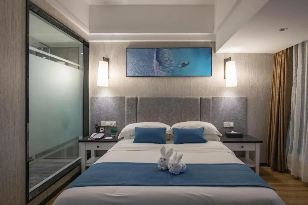 Bed in Ramada Encore by Wyndham Qionghai Downtown