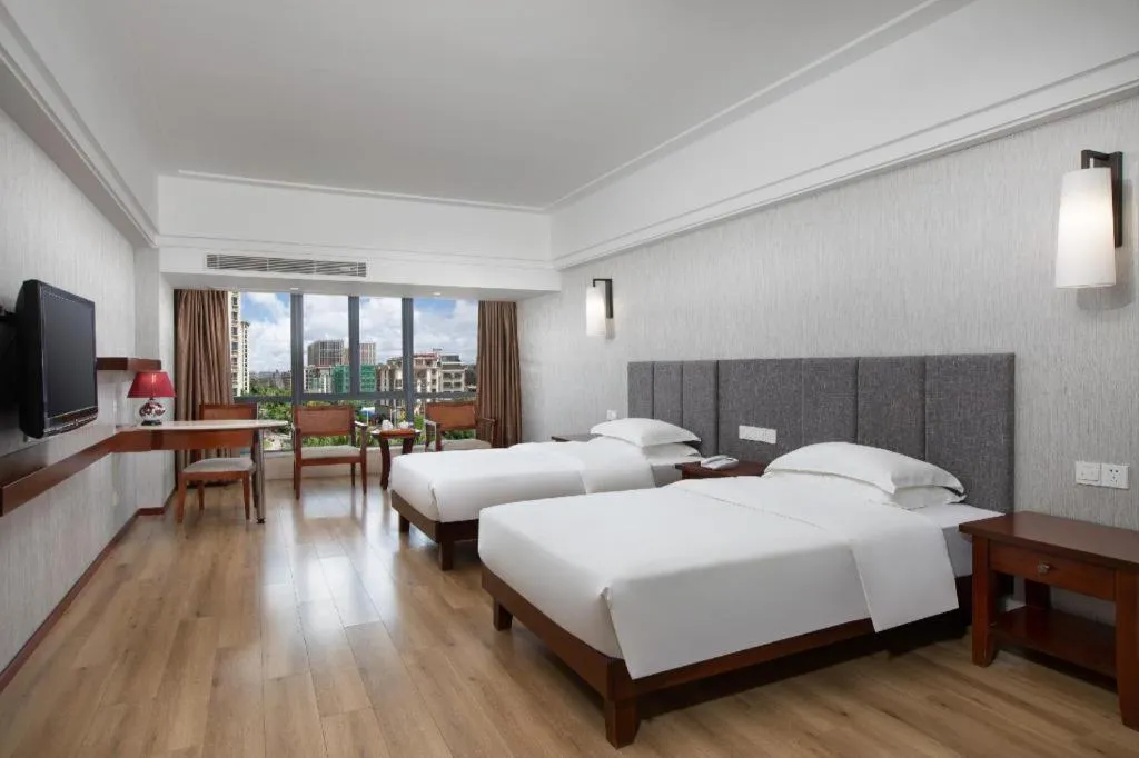Bed in Ramada Encore by Wyndham Qionghai Downtown