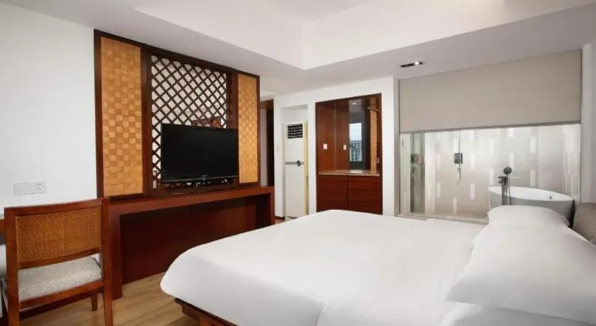 Bed in Ramada Encore by Wyndham Qionghai Downtown
