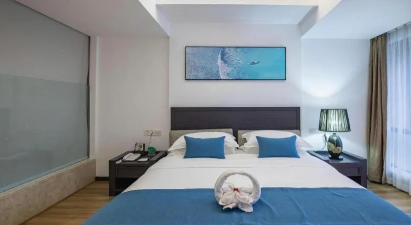 Bed in Ramada Encore by Wyndham Qionghai Downtown