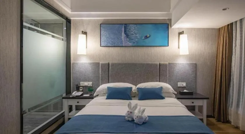 Bed in Ramada Encore by Wyndham Qionghai Downtown