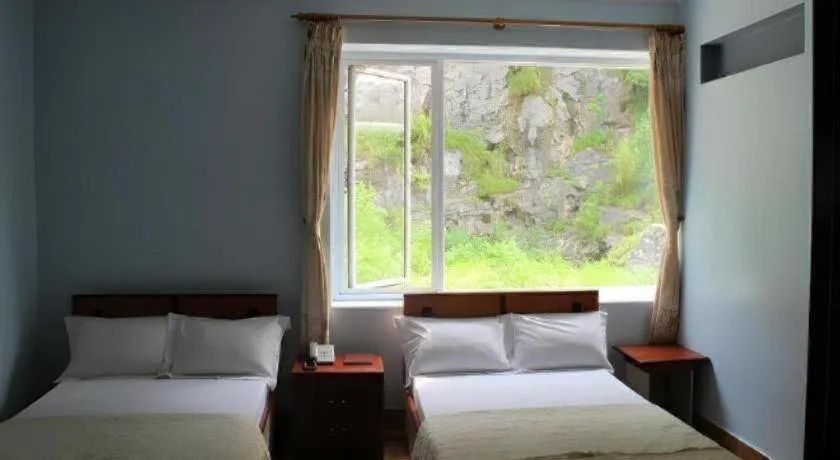 Bed in Ciao CatBa Hotel