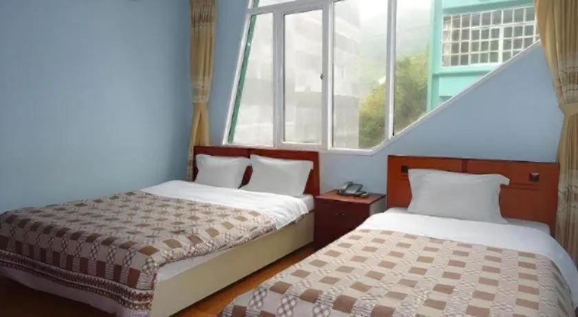 Bed in Ciao CatBa Hotel