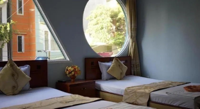 Bed in Ciao CatBa Hotel