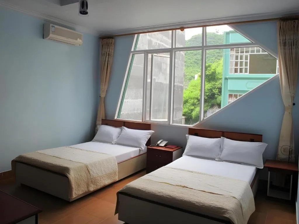 Bed in Ciao CatBa Hotel