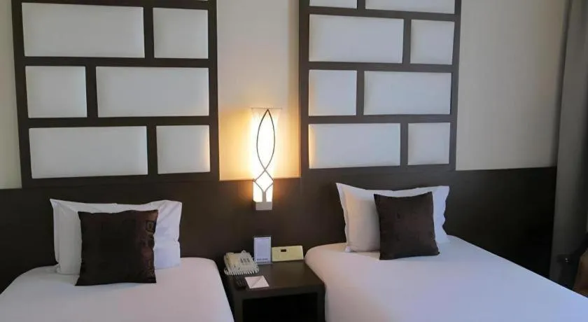 Bed in Kedaton Hotel