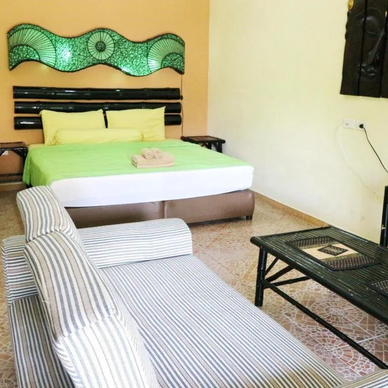 Bed in Kamala Tropical Garden Hotel