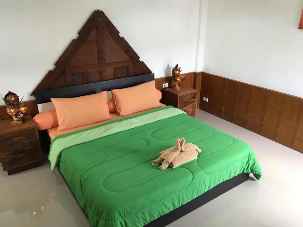 Bed in Kamala Tropical Garden Hotel