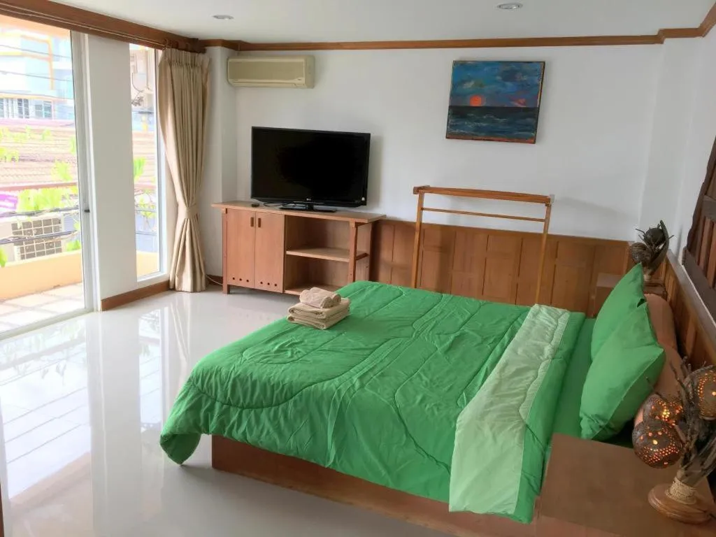 Bed in Kamala Tropical Garden Hotel