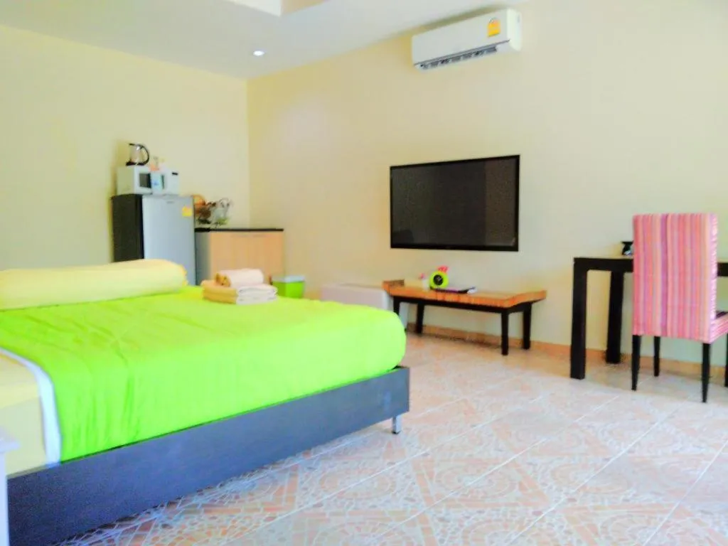 Bed in Kamala Tropical Garden Hotel