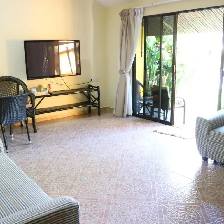 Bed in Kamala Tropical Garden Hotel