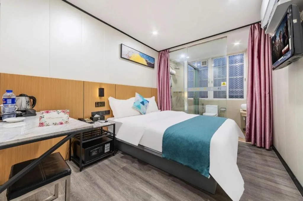 Bed in Xinghe Xinfeng Hotel Railway Station & Bus Station Branch