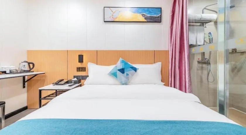 Bed in Xinghe Xinfeng Hotel Railway Station & Bus Station Branch