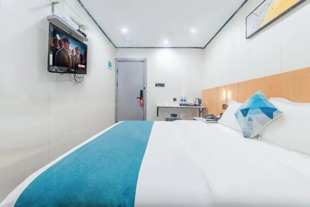 Bed in Xinghe Xinfeng Hotel Railway Station & Bus Station Branch