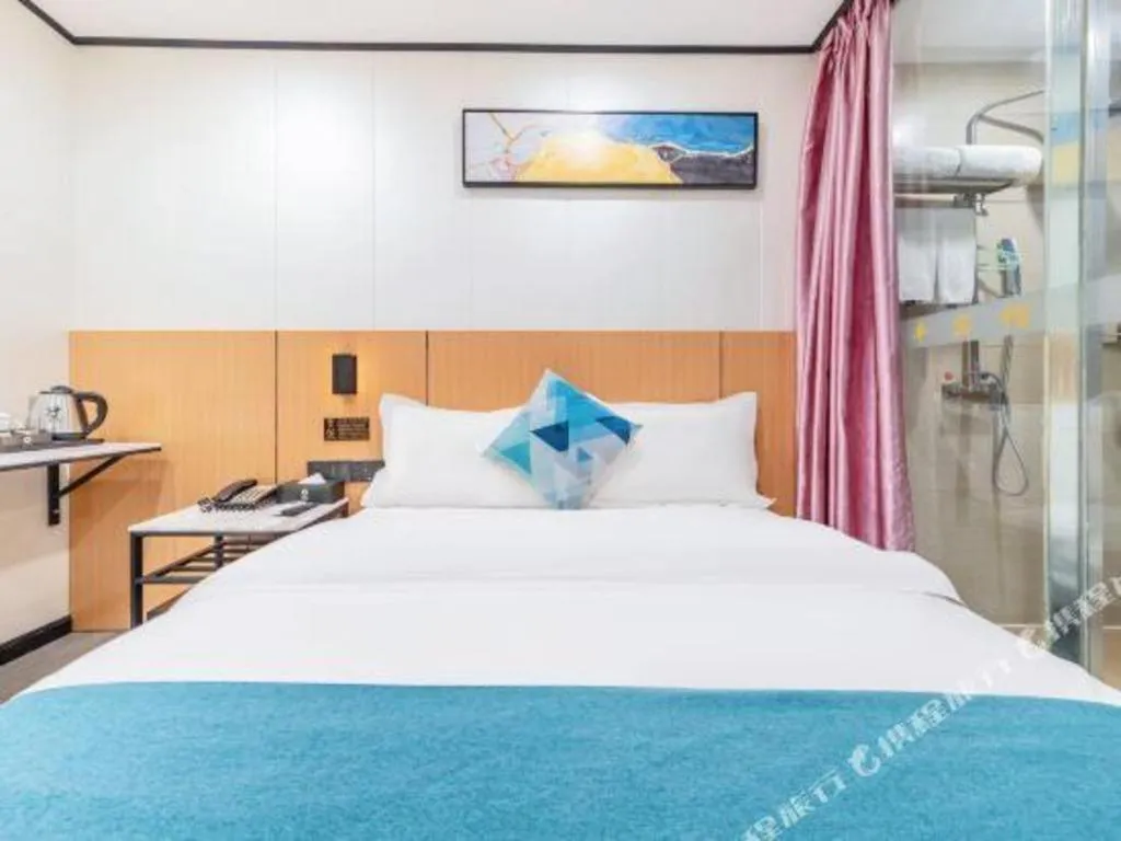 Bed in Xinghe Xinfeng Hotel Railway Station & Bus Station Branch