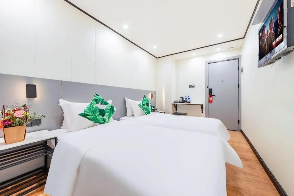 Bed in Xinghe Xinfeng Hotel Railway Station & Bus Station Branch