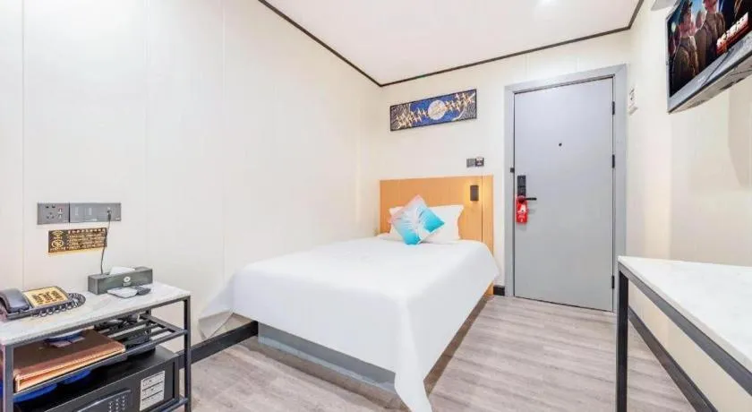 Bed in Xinghe Xinfeng Hotel Railway Station & Bus Station Branch