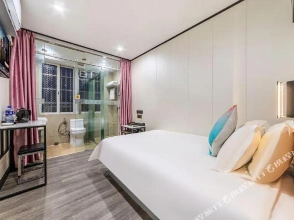 Bed in Xinghe Xinfeng Hotel Railway Station & Bus Station Branch