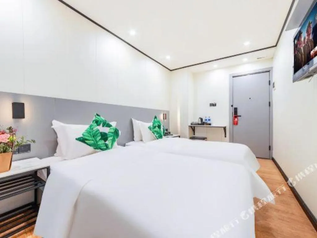 Bed in Xinghe Xinfeng Hotel Railway Station & Bus Station Branch