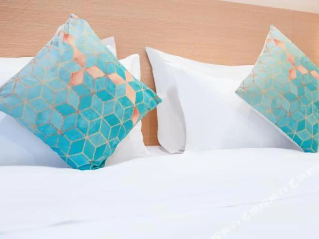 Bed in Xinghe Xinfeng Hotel Railway Station & Bus Station Branch