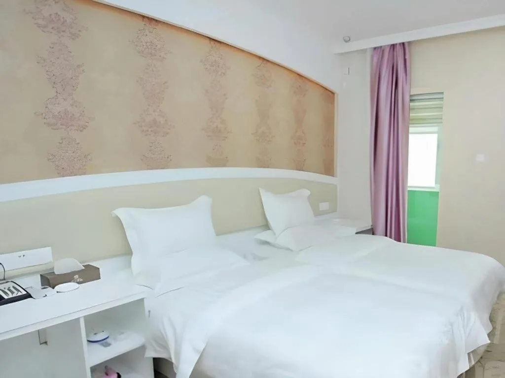 Bed in Xinghe Xinfeng Hotel Railway Station & Bus Station Branch