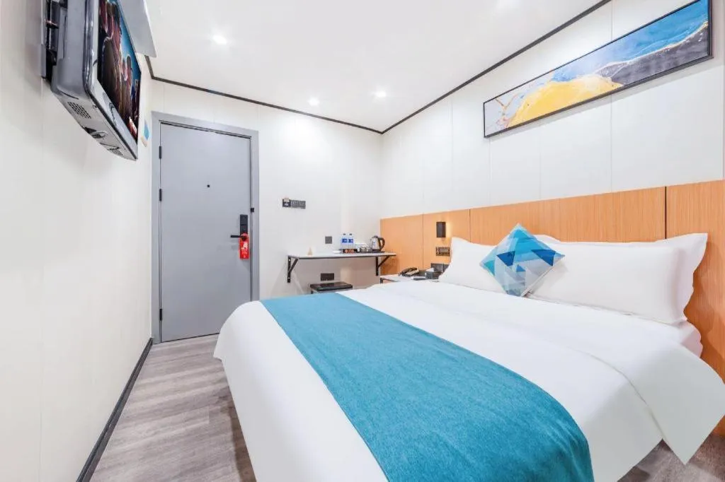 Bed in Xinghe Xinfeng Hotel Railway Station & Bus Station Branch