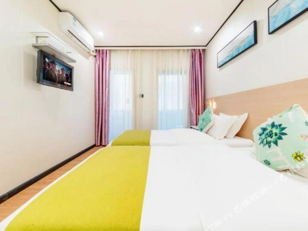 Bed in Xinghe Xinfeng Hotel Railway Station & Bus Station Branch