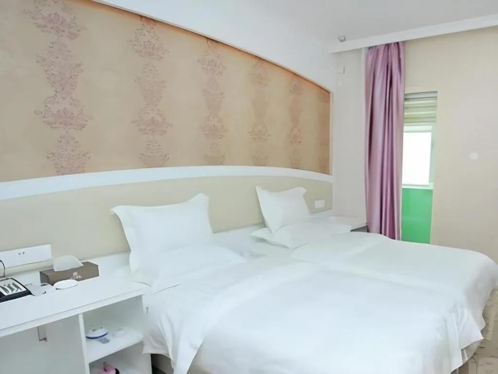 Bed in Xinghe Xinfeng Hotel Railway Station & Bus Station Branch