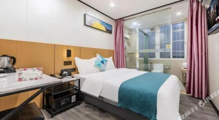 Bed in Xinghe Xinfeng Hotel Railway Station & Bus Station Branch