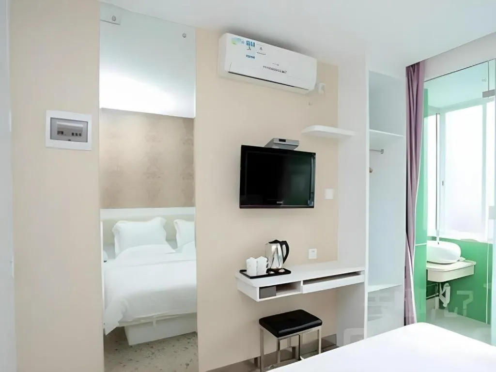 Bed in Xinghe Xinfeng Hotel Railway Station & Bus Station Branch