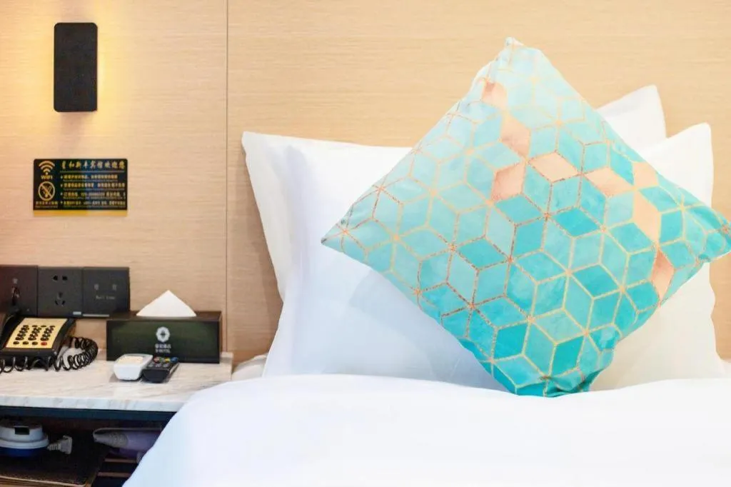 Bed in Xinghe Xinfeng Hotel Railway Station & Bus Station Branch