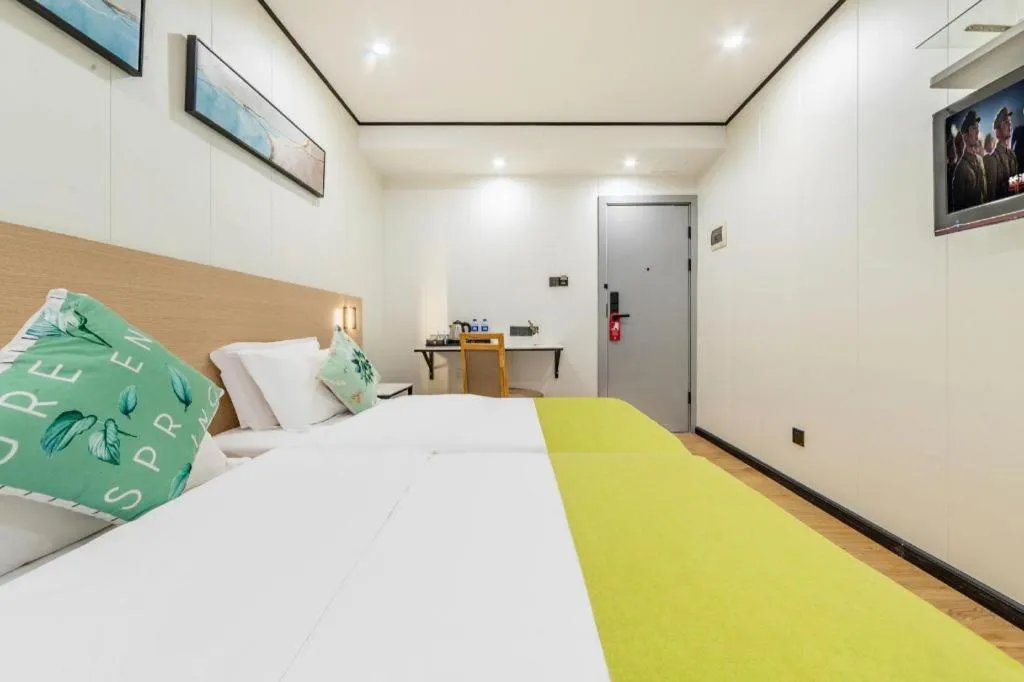 Bed in Xinghe Xinfeng Hotel Railway Station & Bus Station Branch