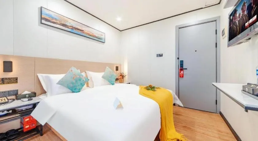 Bed in Xinghe Xinfeng Hotel Railway Station & Bus Station Branch