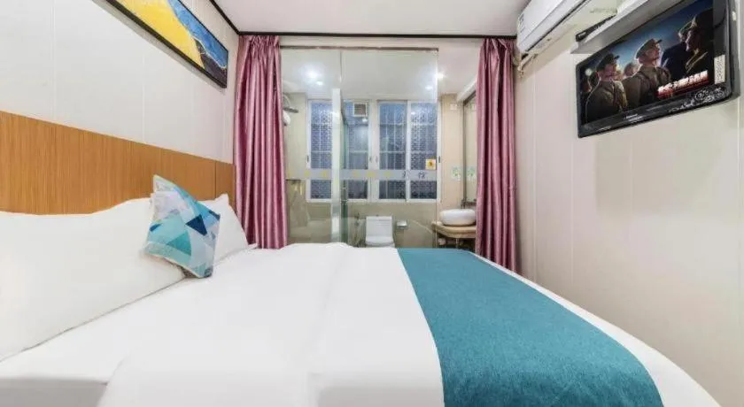 Bed in Xinghe Xinfeng Hotel Railway Station & Bus Station Branch