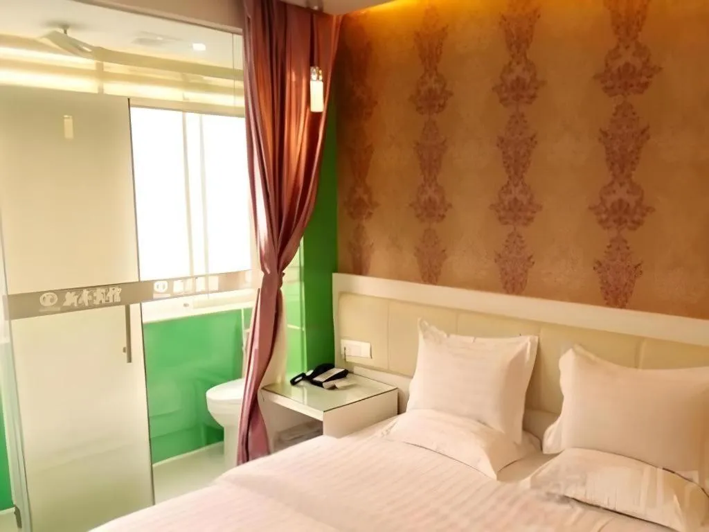 Bed in Xinghe Xinfeng Hotel Railway Station & Bus Station Branch