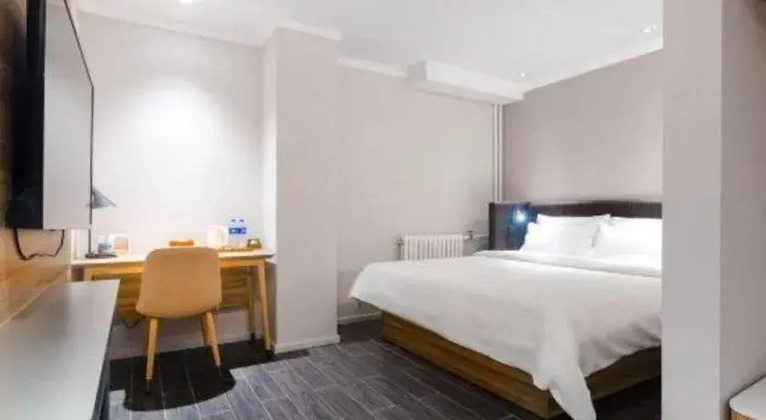 Bed in Hanting Premium Hotel Beijing Wudaokou East Gate of Tsinghua Bed in Hanting Premium Hotel Beijing Wudaokou East Gate of Tsinghua